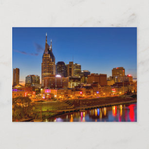 View of the city skyline at dusk postcard