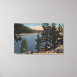 View of the Lake through the Pines Canvas Print