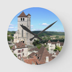 View of the village and the church (photo) round clock