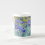 Vincent Van Gogh Irises Floral Vintage Fine Art Bone China Mug<br><div class="desc">Vincent Van Gogh Blue Irises Floral Fine Art Irises is one of many paintings of irises by the Dutch Post-Impressionist artist Vincent van Gogh. Like many artists of his time Van Gogh was influenced by Japanese ukiyo-e woodblock prints. The strong outlines, unusual angles, including close-up views, is a typical element...</div>