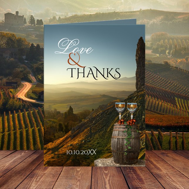 Vineyard Wine Wedding Photo Thank You Card (Wedding Thank You card showing two wine glasses and grapes on a wine barrel overlooking a vineyard)