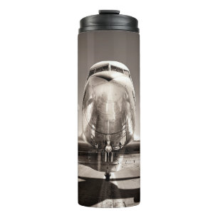 vintage airplane on a runway thermal tumbler