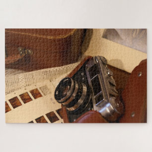 Vintage analog camera in leather brown case jigsaw puzzle