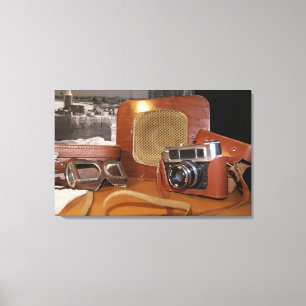 Vintage analogue camera in leather brown case canvas print