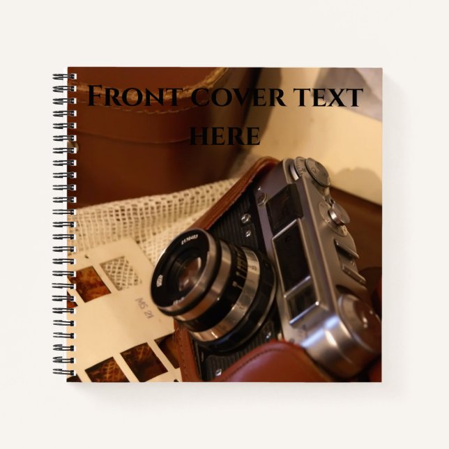 Vintage analogue camera in leather brown case notebook (Front)