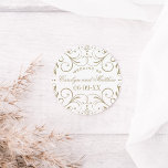 Vintage Antique Gold Flourish Wedding Monogram Classic Round Sticker<br><div class="desc">Decorative swirls and flourishes frame this elegant round vintage inspired wedding favour sticker design. White and antique gold colour scheme. Personalize the custom text with a monogram of the bride and groom names and wedding date.</div>