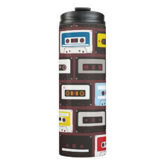 Vintage audio cassettes, seamless background. thermal tumbler