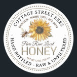 Vintage Bee Honey Label Hand Bottled Raw<br><div class="desc">Central design features a vintage sunflower illustration and watercolor honeybee. Personalize with your apiary name,  address and honey description (raw,  hand bottled,  single source etc.). Also include your honey net weight. Common honey net weight conversions: 8oz (227g),  12oz (340g),  16oz (454g),  32oz (907g),  5lb (2.27kg).</div>