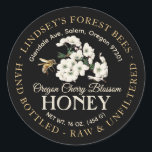 Vintage Bee Honey Label Hand Bottled Raw Black<br><div class="desc">Central design features a branch of fruit blossoms (cherry) and a realistic honeybee in flight. Personalize with your apiary name, address and honey description (raw, hand bottled, single source etc.). Also include your honey net weight. Common honey net weight conversions: 8oz (227g), 12oz (340g), 16oz (454g), 32oz (907g), 5lb (2.27kg)....</div>