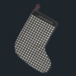 Vintage Black and White Gingham Plaid Personalized Small Christmas Stocking<br><div class="desc">Add timeless charm to your holiday decor with this vintage black and white gingham plaid personalized Christmas stocking. The classic plaid design brings a cozy, rustic feel to your mantel, while the personalized name adds a special touch. Perfect for those searching for personalized stockings, vintage-inspired holiday decor, or traditional black...</div>