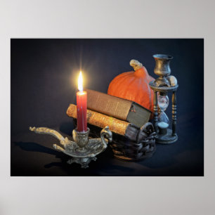 Vintage books and hourglass on dark table poster