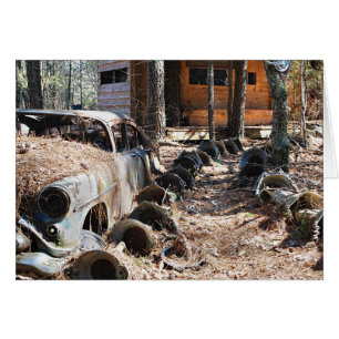 Vintage Car, Hubcaps, and Shack