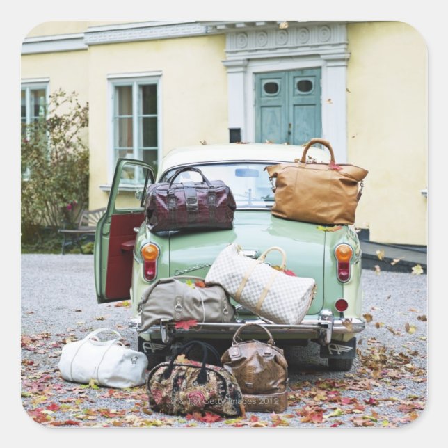 Vintage car with lots of luggage square sticker (Front)