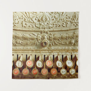 Vintage cash register, covered in dust and cobweb tapestry