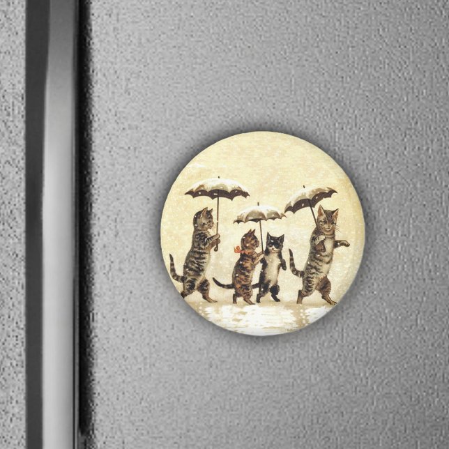 Vintage Cats Umbrella Snow Magnet (Brown striped cats walking upright with umbrellas in snow on yellow round magnet.)