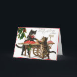 Vintage Christmas card<br><div class="desc">What a sweet vintage Christmas card this is!  Two cute cats at the market place on Christmas.  A black cat with a red bandana tied around his neck makes a trade with a brown and ginger striped cat.  The card read "Loving Christmas Wishes".</div>