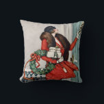 Vintage Christmas Doorstep Illustration Throw Pillow<br><div class="desc">Celebrate the charm of a classic winter holiday with this beautiful vintage-style illustration featuring an elegant woman in a vibrant red coat delivering festive gifts. Holding a holly wreath and ringing a doorbell in the snow, this nostalgic scene captures the warmth and sophistication of early 20th-century holiday fashion and seasonal...</div>