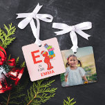 Vintage Christmas Elmo Personalized Photo Metal Ornament<br><div class="desc">This festive metal ornament features a vintage-inspired design of Elmo from Sesame Street, bringing holiday cheer to your decorations. The ornament includes customizable text for adding a name and space for a personal photo, making it a unique keepsake. Perfect for fans of Elmo and Sesame Street, this ornament adds charm...</div>