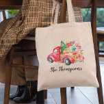 Vintage Christmas Red Truck | Family Name Tote Bag<br><div class="desc">Personalized christmas holiday tote bag featuring a vintage red truck carrying gifts,  a christmas tree,  a scattering of wintery snow,  and your family name.</div>