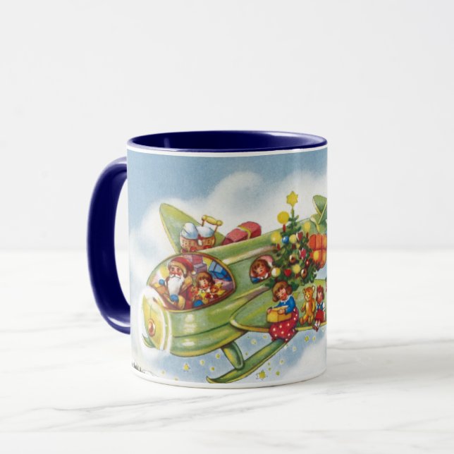 Vintage Christmas, Santa Claus Flying an Airplane Mug (Front Left)