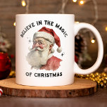 Vintage Christmas Santa Claus Mug<br><div class="desc">This holiday mug features a vintage Santa Claus with the words,  Believe in the magic of Christmas. Fill it with cocoa or treats,  and it will makes a fun gift for Christmas. Designed for you by Blackberry Boulevard.</div>
