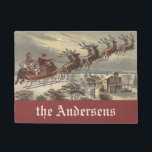 Vintage Christmas, Victorian Santa Claus in Sleigh Doormat<br><div class="desc">Easy to personalize your doormat to welcome family, friends and neighbours. Vintage illustration Victorian Merry Christmas holiday design featuring Santa Claus in his sleigh with his reindeer delivering toys on Christmas Eve. Saint Nicholas flying through the sky over a town with houses in the light of the moon. By Thomas...</div>