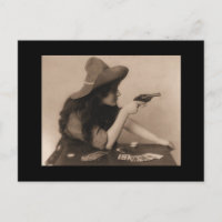 Vintage cowgirl with gun postcard