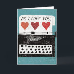 Vintage Desktop - Typewriter Card<br><div class="desc">© Michael Mullan / Wild Apple. An old black and white typewriter with a blue background. The words PS I Love You can be seen on the image.</div>
