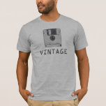 Vintage Floppy T-Shirt<br><div class="desc">This funny, computer themed t-shirt features an old school floppy disc and the word Vintage underneath. A nostalgic image for geeks, techs, and anyone who uses computers.</div>