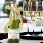 Vintage Gold Flourish Elegant Wedding Mini Sparkling Wine Label<br><div class="desc">These mini sparkling wine bottle labels will make your wedding celebration all the more festive. They feature a design that is simple yet elegant with gold text on a white background with a gold faux foil floral border. The text reads: Thank You for Celebrating with Us with spaces to enter...</div>