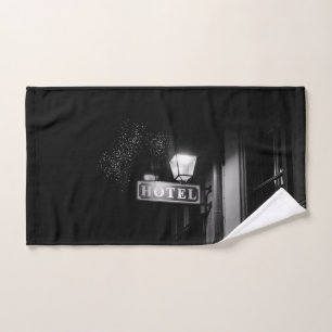Vintage hotel sign, street light and many light hand towel