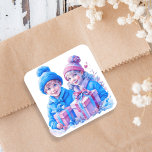 Vintage Kids with Blue and Pink Christmas Square Sticker<br><div class="desc">Adorable little vintage girl and boy in pink and blue holding gift boxes with a floral and snowy background. Add a sweet retro or nostalgic vibe to your Christmas cards or party treat bags!</div>