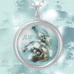 Vintage Lily Brooch Pastel Blue Silver Plated Necklace<br><div class="desc">Customize this beautiful floral pendant necklace with her initials for a truly elegant gift she will treasure. The image in pastel blue is of a vintage metal brooch of a pair of lilies and is ultra feminine and unique.

This image is original jewellery photography of JLW_Photography.</div>