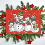 Vintage Merry Snowman Family Custom Christmas Holiday Card<br><div class="desc">Spread holiday cheer with this vintage Christmas card that features a cute snow family decked out in holiday winter wear and carrying presents.  Personalize by customizing the message on the back and/or adding your name(s) or leave the text boxes blank if you would rather add handwritten messages before delivering.</div>