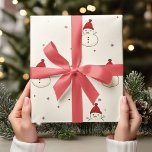 Vintage Neutral Christmas Snowmen with Red Hat Wrapping Paper<br><div class="desc">Wrap your holiday gifts in cozy nostalgia with this Vintage Christmas Snowmen Wrapping Paper, featuring charming snowmen in red hats on a neutral background. This classic design brings a touch of vintage warmth to any present, making it perfect for a timeless Christmas look. Ideal for family gatherings or holiday celebrations,...</div>
