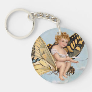 Vintage New Years card, child riding butterfly Keychain