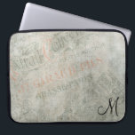 Vintage Parisian Advertisement with Monogram Laptop Sleeve<br><div class="desc">Customize with your own initial or remove the text.  A collage of vintage paris advertisement parchments. These ads are written in fancy elegant fonts and appear faded and worn. The texture looks old and weathered in greyish,  green,  and pale orangish coral tones. A chic and trendy style.</div>