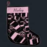 Vintage Personalized Name Pink Packages Pattern Small Christmas Stocking<br><div class="desc">You'll truly love this cute Vintage Personalized Name Pink Packages Pattern Christmas Stocking! Black background with a vintage style pink Christmas gifts pattern. Customized with pink at the top and a family member's name.

A matching stocking for each family member will look fabulous on your fireplace mantel!</div>