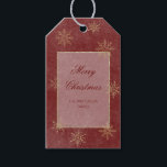 Vintage Red & Gold Glitter Snowflakes Gift Tags<br><div class="desc">Against a backdrop of rich, earthy dark green reminiscent of pine trees, this gift tag sets the stage for a truly magical look. The rich red is beautifully distressed with delicate white etchings, like ethereal constellations, while golden glittering snowflakes sprinkle across the canvas, adding a touch of whimsy and sparkle....</div>