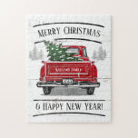 Vintage Red Truck with Christmas Tree Family Name Jigsaw Puzzle<br><div class="desc">Get together with your family to make this rustic themed jigsaw puzzle. This design features a vintage red truck with Christmas tree on a white weathered wood background with pine trees. The black typography reads "Merry Christmas & Happy New Year!" The back of the truck has your family name and...</div>