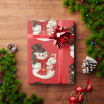 Vintage Retro Jolly Snowman In Top Hat Christmas Wrapping Paper<br><div class="desc">This fun and festive holiday wrapping paper is a throwback to the classic mid-century Christmas designs.  A patterned design featuring a jolly snowman wearing a top hat,  scarf and holding a candy cane against a traditional Christmas red background that's sure to add a vintage classic touch to your gifts.</div>