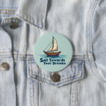 Vintage Sailboat Nautical Inspirational Quote 3 Inch Round Button<br><div class="desc">Set sail toward your dreams with this beautifully illustrated vintage sailboat design, featuring warm wooden tones, billowing cream sails, and gentle ocean waves. The hand-drawn style gives this piece a timeless, maritime charm, perfect for lovers of adventure and the open sea. Below the boat, the phrase “Sail Towards Your Dreams”...</div>