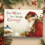 Vintage Santa and Child with Christmas Letter Holiday Card<br><div class="desc">Nostalgic image of Victorian era red-robed Santa Claus carrying bag of toys receiving a letter from a shy child in blue coat and hat.  Complementary image on reverse with customizable text.</div>