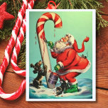 Vintage Santa Claus Painting A Candy Cane Holiday Postcard<br><div class="desc">Vintage Santa painting a candy cane illustration.</div>