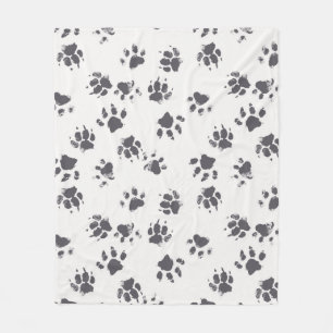 vintage seamless pattern with paw footprints of a fleece blanket