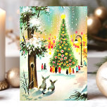 Vintage Snow Bunnies Christmas Tree Scene Holiday Card<br><div class="desc">Vintage Snow Bunnies Christmas Tree Scene Holiday Card. This design features bunnies in the snow in front of a lit Christmas Tree. What a beautiful retro holiday scene. Personalize this custom design with your own inside greeting.</div>