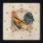 Vintage Style French Country Rustic Barn Rooster Square Wall Clock<br><div class="desc">COLOR PALETTE: black, cream, tan, brown, and touches of red. DESIGN COLLECTION: Hand painted watercolor by Audrey Jeanne Roberts, the rooster is golden brown, gold, black and blue, which is layered over a vintage etched swirl printer's ornament decorative frame on a distressed, worn, grunged and crackled finish antiques tan hand...</div>