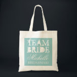 Vintage team bride wedding tote bags | Teal blue<br><div class="desc">Vintage team bride wedding tote bag with personalized name. Vintage chic style design. Customize for bridesmaids,  flower girls,  maid of honor,  mother of the bride,  guests etc. Elegant script text for name. Teal turquoise blue color.</div>
