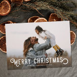 Vintage Typography and Oranges Merry Christmas Holiday Card<br><div class="desc">This beautiful holiday photo card features vintage styled typography reading, "Merry Christmas." The back of the card contains a vintage design of winter oranges and blossoms. A dark gradient photo overlay on the front of the card allows the white text to stand out against your photo - the size and...</div>