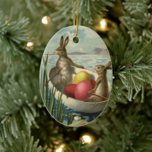 Vintage Victorian Easter Bunnies in an Egg Boat Ceramic Ornament